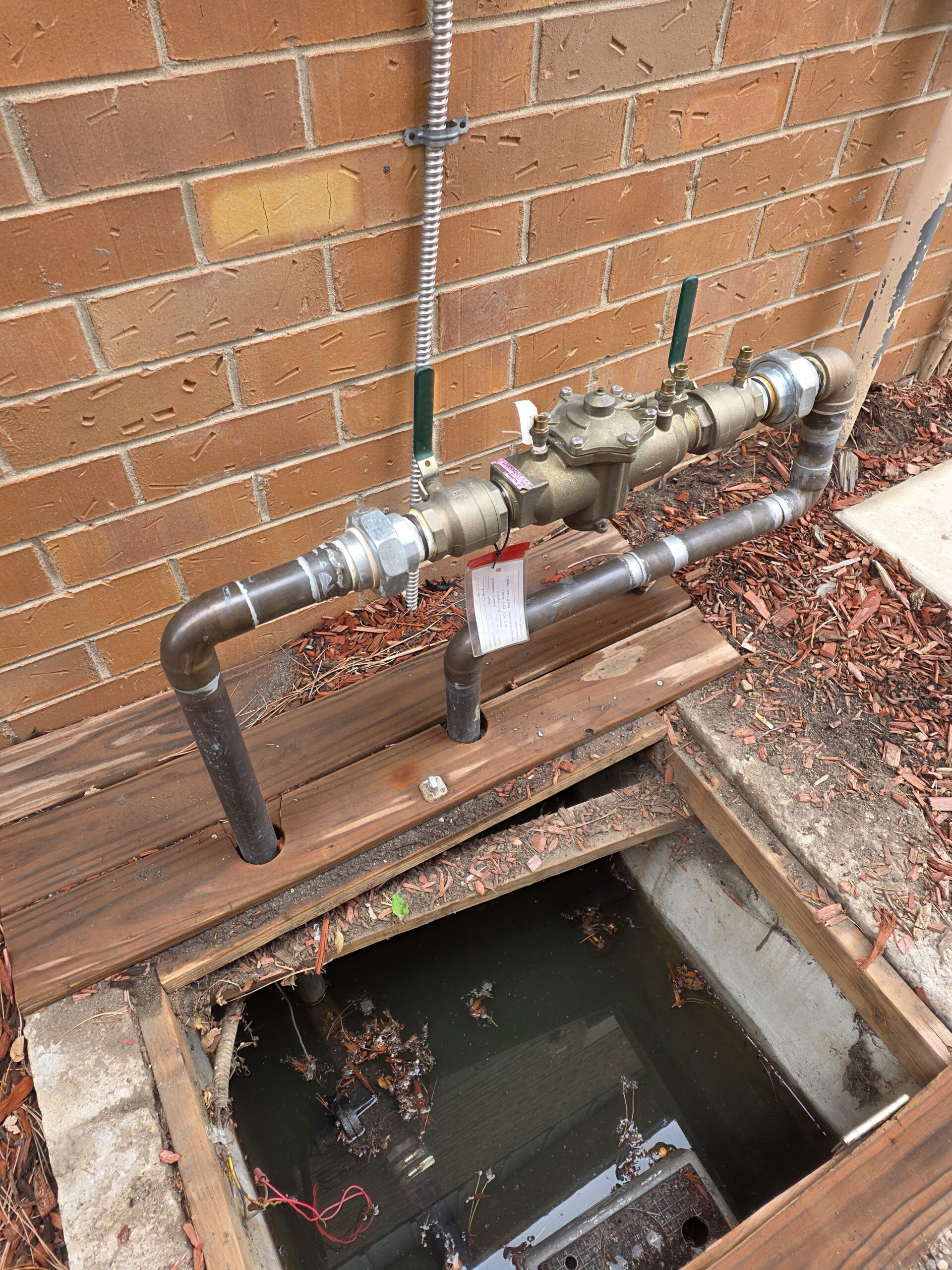 irrigation back flow with leak in the pit